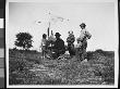 Under An Umbrella, Painting A Landscape, Surrounded By Wife And Children At Canarsie by Wallace G. Levison Limited Edition Print