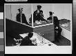 Nazi War Criminal Adolf Eichmann Sitting In Glass Booth Surrounded By Guards by Gjon Mili Limited Edition Pricing Art Print