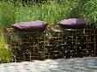 Purple Cushions On Steel Cage Seat Made From Gabions Filled With Bottles, (Chelsea 2005) by Clive Nichols Limited Edition Pricing Art Print