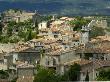 View Of The Village Of Saignon, With Red Tile Roofs On Stone Houses by Stephen Sharnoff Limited Edition Print