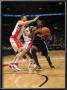 Denver Nuggets V Toronto Raptors: Andrea Bargnani And Nene by Ron Turenne Limited Edition Print