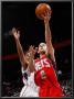 New Jersey Nets V Atlanta Hawks: Jeff Teague And Jordan Farmar by Kevin Cox Limited Edition Print