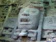 Large Stone Head In Mayan Ruin Of Lamani In Belize by Stephen Sharnoff Limited Edition Print