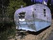 Old Camper At A Car Cemetery In Colorado by Michael Brown Limited Edition Print