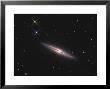 Ngc 4013 Is An Edge-On Unbarred Spiral Galaxy In The Constellation Ursa Major by Stocktrek Images Limited Edition Print