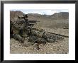 A Marine Rifleman Provides Security For Machine Gunners Atop A Hill by Stocktrek Images Limited Edition Print