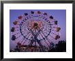 People Ride An Upsidedown Ferris Wheel In Wildwood, New Jersey by Richard Nowitz Limited Edition Print
