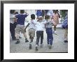 At The Desegregated Lusher School Three Boys Display Camaraderie Walking Through Playground by Bill Eppridge Limited Edition Pricing Art Print