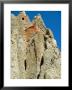 Looking Up At A Buddhist Cave Monastery In Mustang, Nepal by Stephen Sharnoff Limited Edition Print