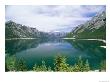 The Palliser Range Is Reflected In Lake Minnewanka by Rich Reid Limited Edition Print