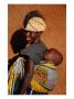 Betamaribe (Somba) Girl With Baby Brother Sleeping On Her Back, Tagaye, Benin by Craig Pershouse Limited Edition Print