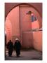 Two Men Walking Along A Covered Street In The Medina, Marrakesh, Morocco by John Elk Iii Limited Edition Print
