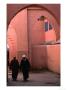 Two Men Walking Along A Covered Street In The Medina, Marrakesh, Morocco by John Elk Iii Limited Edition Print