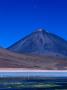 Flamingos Beneath Licancabur Volcano, Lake Blanca, Bolivia by Woods Wheatcroft Limited Edition Print