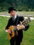 Man Playing A Guitar And Mouth Organ, Skagway, Alaska by Lee Foster Limited Edition Pricing Art Print