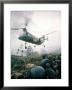 American Helicopter H-21 Hovering Above Soldiers In Combat Zone During Vietnam War by Larry Burrows Limited Edition Pricing Art Print