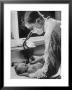 Intern At Minneapolis General Hospital Listening With Stethoscope To Newborn Baby's Heartbeat by Alfred Eisenstaedt Limited Edition Print