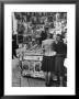 Women Browsing Through The Newspaper And Magazine Stand by Carl Mydans Limited Edition Print