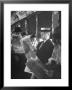 Commuters Sitting On A Train And Reading The Chicago Tribune by Charles E. Steinheimer Limited Edition Print