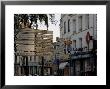 Signs In Town Centre, St. Omer, Pas De Calais, France by David Hughes Limited Edition Pricing Art Print