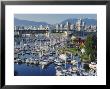 City Centre Seen Across Marina In Granville Basin, Vancouver, British Columbia, Canada by Anthony Waltham Limited Edition Print