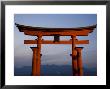 The Vermillion Coloured Floating Torii Gate Of The Shinto Shrine, Island Of Honshu, Japan by Gavin Hellier Limited Edition Print