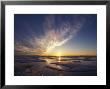 Wispy Clouds And Melting Ice At Sunet In An Arctic Landscape by Paul Nicklen Limited Edition Print