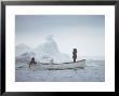 Nativa Alaskan Fishermen Hunters In Their Small Boat In The Icy Waters Of Alaska by Ralph Crane Limited Edition Print