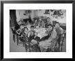 Portrait Of A Family Of Tuscan Tennat Farmers Sitting Around Dinner Table by Alfred Eisenstaedt Limited Edition Print