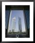Emirates Towers Through Dubai International Financial Center Arch, Sheikh Zayed Road, Dubai, Uae by Walter Bibikow Limited Edition Pricing Art Print