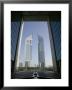 Emirates Towers Through Dubai International Financial Center Arch, Sheikh Zayed Road, Dubai, Uae by Walter Bibikow Limited Edition Print