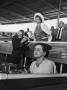 Desi Arnaz Smiling As His Wife Lucille Ball Stands Up During Horse Race At The Delmar Track by Leonard Mccombe Limited Edition Print