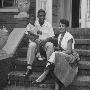Baseball Star Jackie Robinson With Wife Rachel And Son Jackie Jr. Sitting On Front Steps Of Home by Nina Leen Limited Edition Pricing Art Print