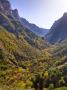 Looking Down Along The Vikos Gorge With The Autumn Foliage And Turquoise Waters Of Voidomatis Sprin by Lizzie Shepherd Limited Edition Print