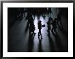 Commuters Silhouetted Inside Grand Central Station At Rush Hour, New York City, Usa by Corey Wise Limited Edition Print