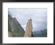 A Climber Stands Atop Tahir Tower, Karakoram Mountains, Pakistan by Jimmy Chin Limited Edition Print