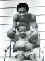 Sugar Ray Leonard And Six-Year-Old Son, Ray Jr. by Maurice Sorrell Limited Edition Pricing Art Print