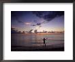 Silhouette Of Person On Beach, Miami Beach, Fl by Jeff Greenberg Limited Edition Pricing Art Print