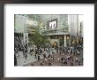 Busy Streets At Shinjuku Station, Tokyo, Japan by Christian Kober Limited Edition Print