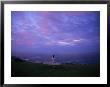 A Visitor Enjoys A Twilight View Of The Maine Coast by Stephen St. John Limited Edition Print
