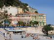 Beach With A Cliff Overlooking The Mediterranean, Nice, Cote D'azure, France by Robert Eighmie Limited Edition Print