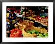 Trader At Market Stall In Old Town, Lijiang, Yunnan, China by Richard I'anson Limited Edition Print