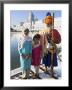 Elderly Couple Of Sikh Pilgrims With Young Girl Posing In Front Of Holy Pool, Amritsar, India by Eitan Simanor Limited Edition Print