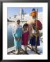 Elderly Couple Of Sikh Pilgrims With Young Girl Posing In Front Of Holy Pool, Amritsar, India by Eitan Simanor Limited Edition Print