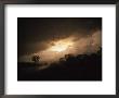 Car Travels A Lonesome Road With A Storm Approaching by David Evans Limited Edition Pricing Art Print