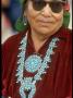 Navajo Woman Wearing Sunglasses Modeling Turquoise Squash Blossom Necklace by Michael Mauney Limited Edition Print