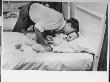 Bobby Kennedy Kissing His Pajama Clad Squealing Young Son by Paul Schutzer Limited Edition Print