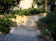 La Chabaude, France, Stone Water Feature On Gravel Terrace With Centranthus Ruber by Clive Nichols Limited Edition Print