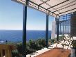 Sonoma House, Stewarts Point, California, 1990 - 1992, Living Room Patio, Architect: Joan Hallberg by Alan Weintraub Limited Edition Print