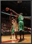Boston Celtics V Toronto Raptors: Shaquille O'neal And Reggie Evans by Ron Turenne Limited Edition Print